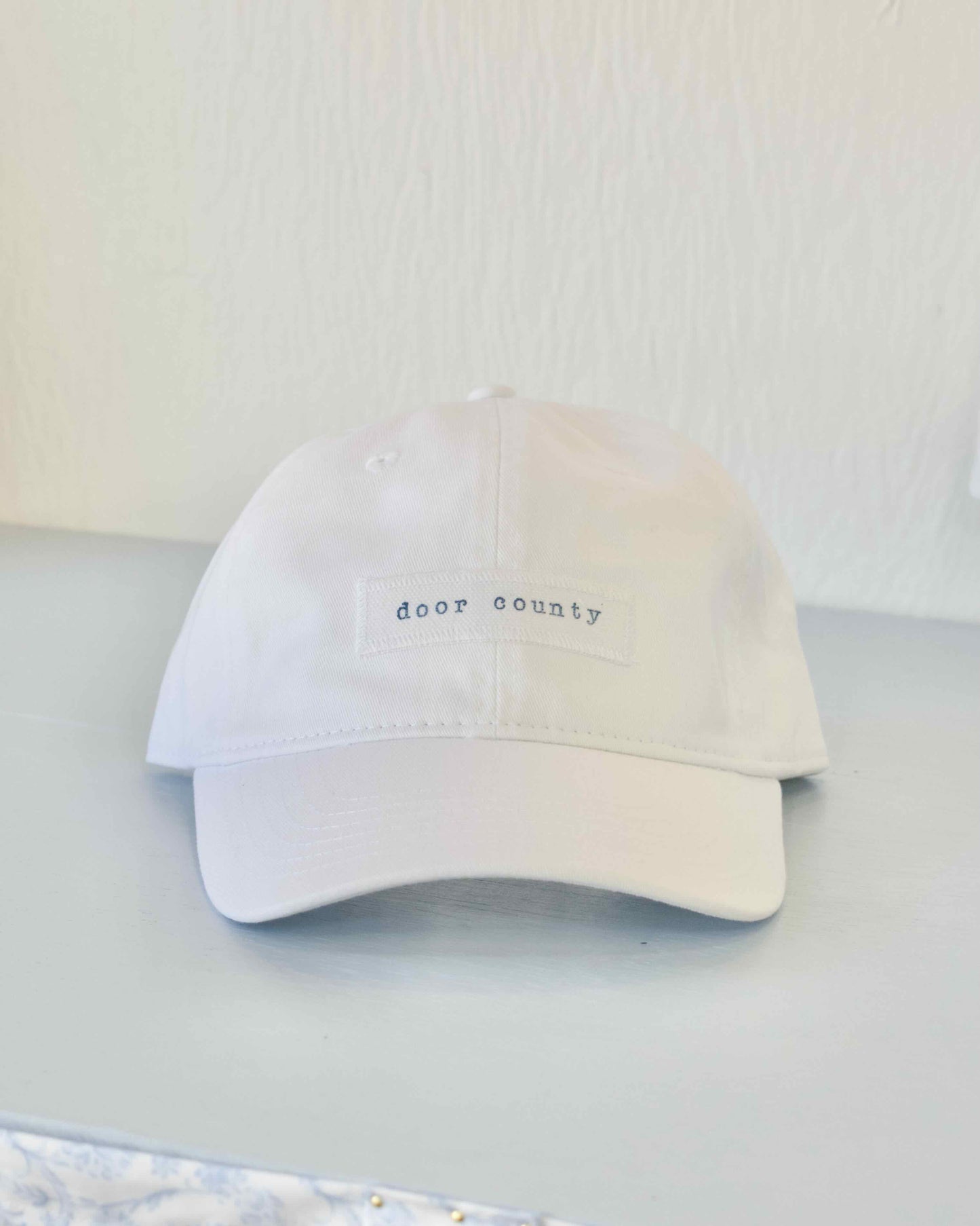 Door County Hand Stamped White Baseball Cap