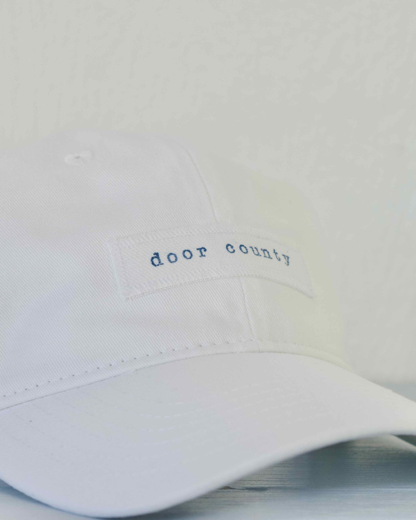 Door County Hand Stamped White Baseball Cap